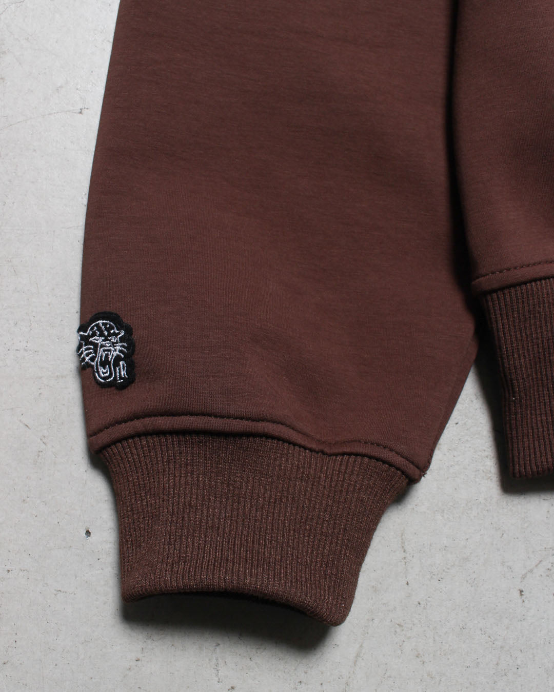 ハーフジップトップス