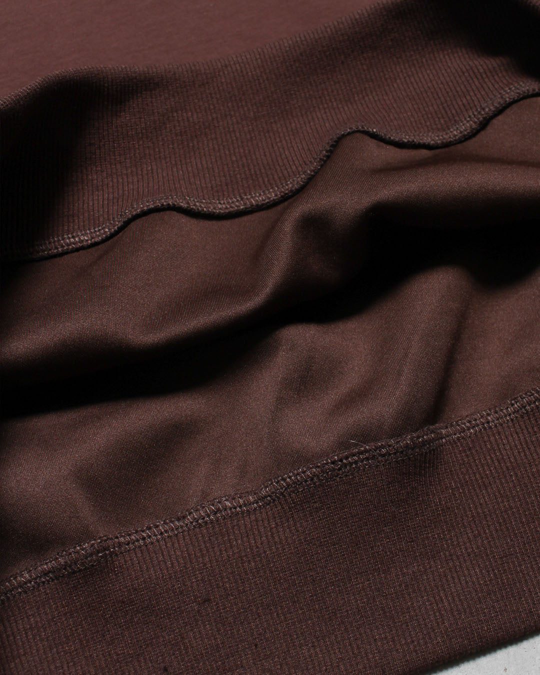 ハーフジップトップス