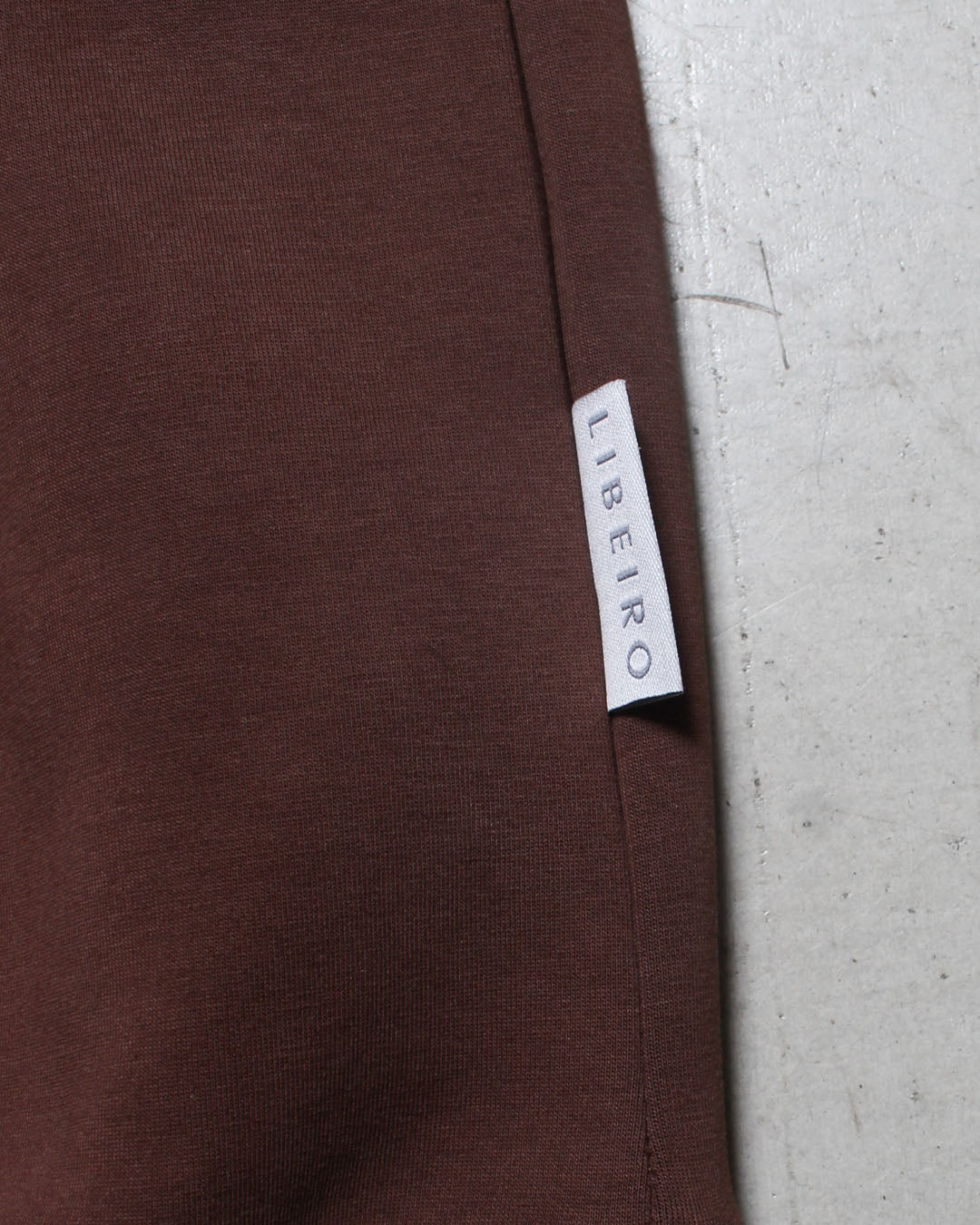 ハーフジップトップス