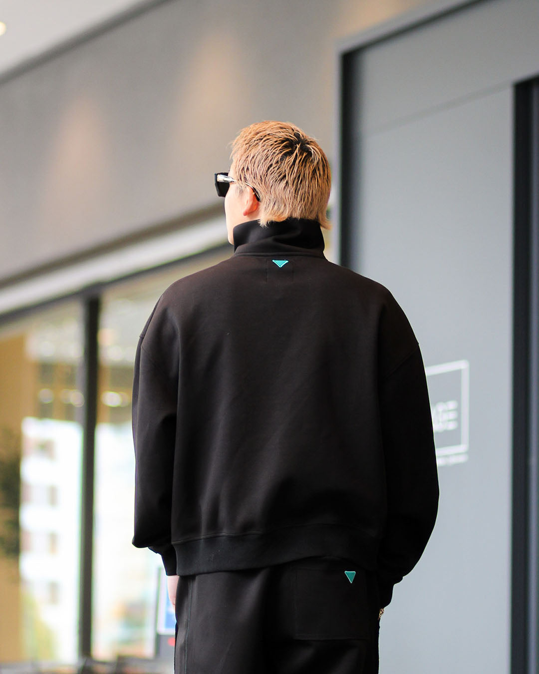 ハーフジップトップス